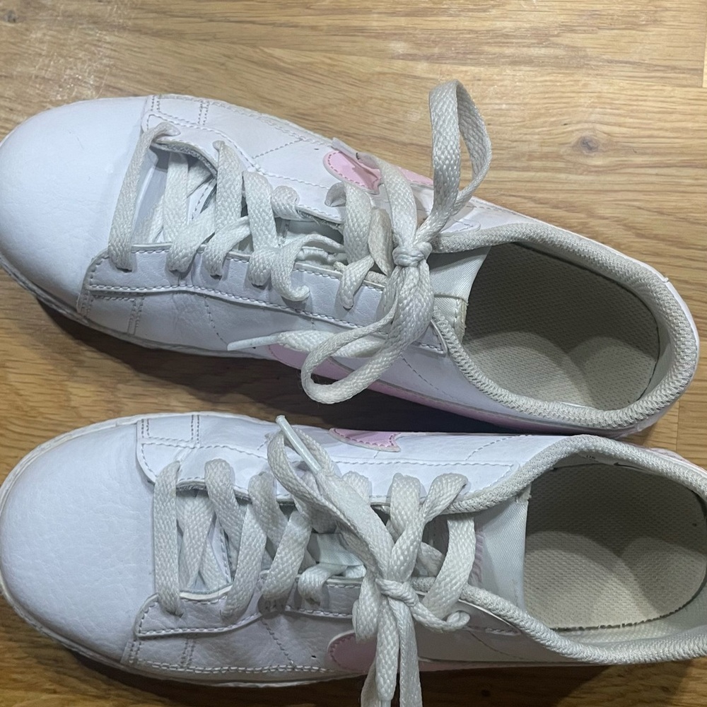 White Nike Sneakers with Pink Accent